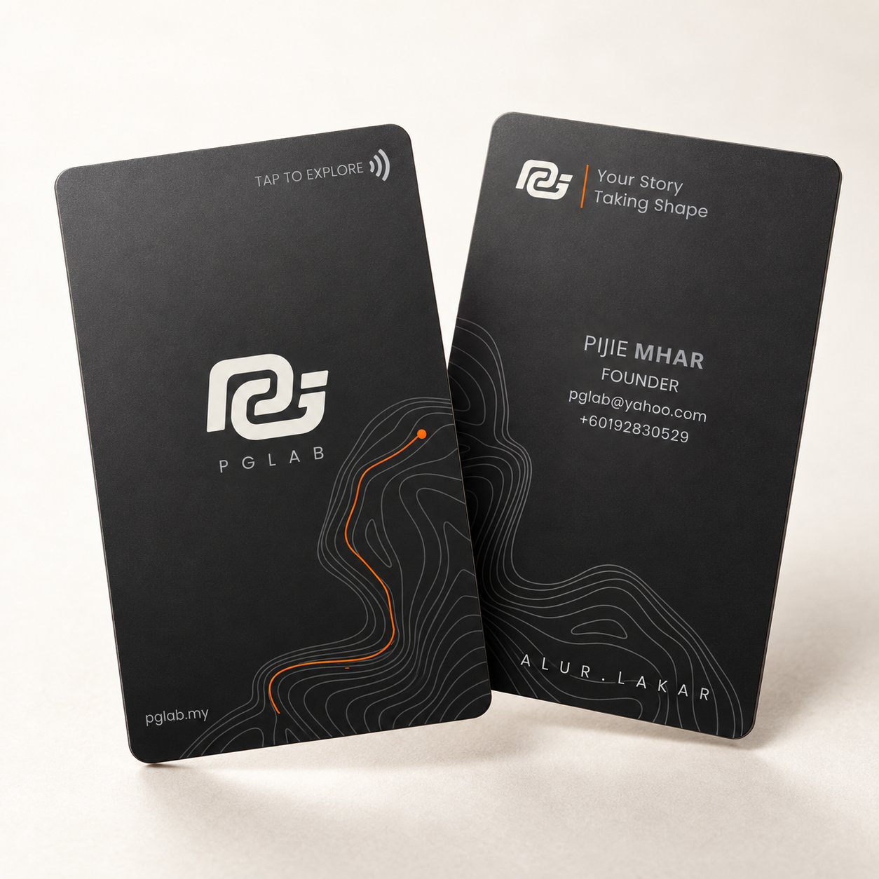 Studio mockup of the PAUT PGLAB NFC card front and back